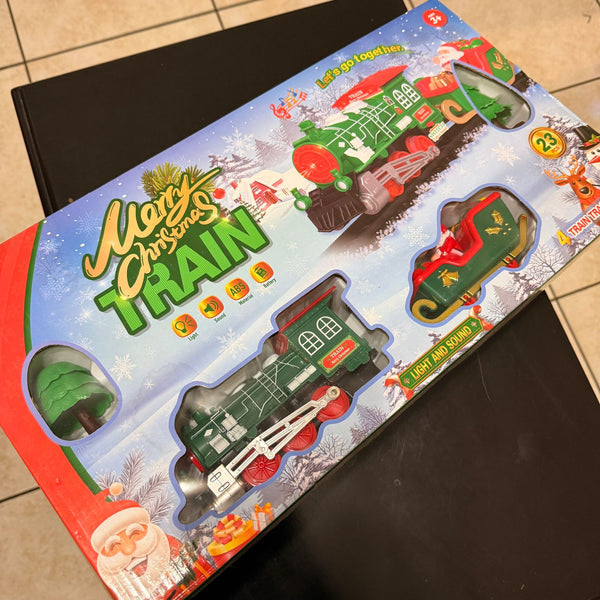 Tren navideño con movimiento sobre las vías circulares