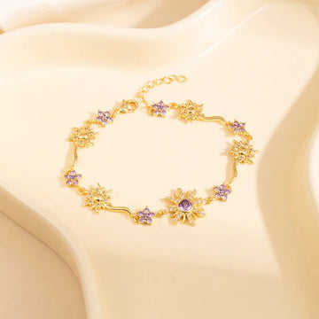 Pulsera de Rapunzel con dije de sol y circones morados
