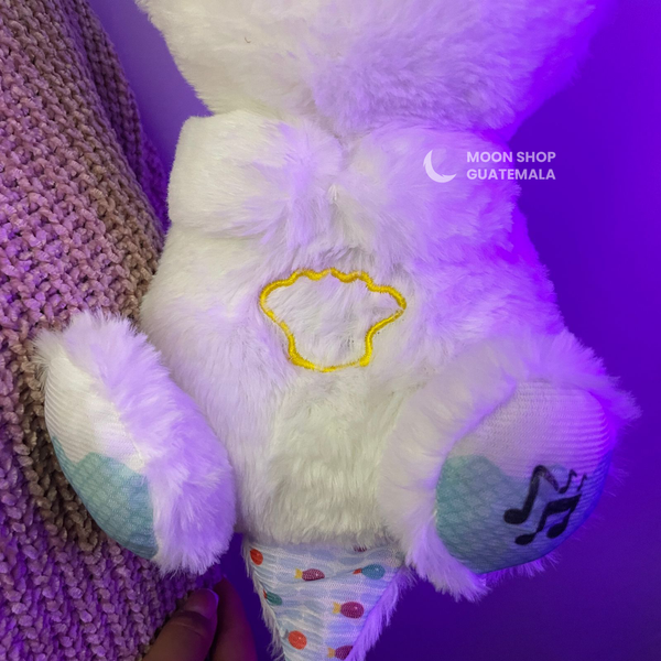 Peluche conejo que respira con música relajante incorporada