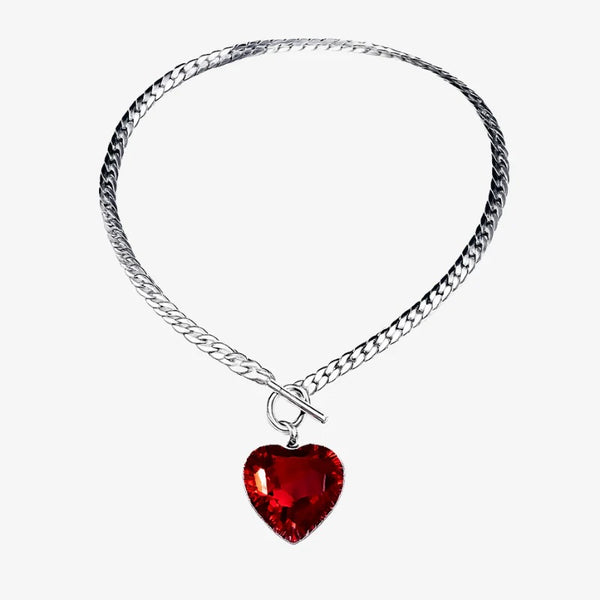 Dije de corazón rojo intenso símbolo de pasión y amor en acero inoxidable